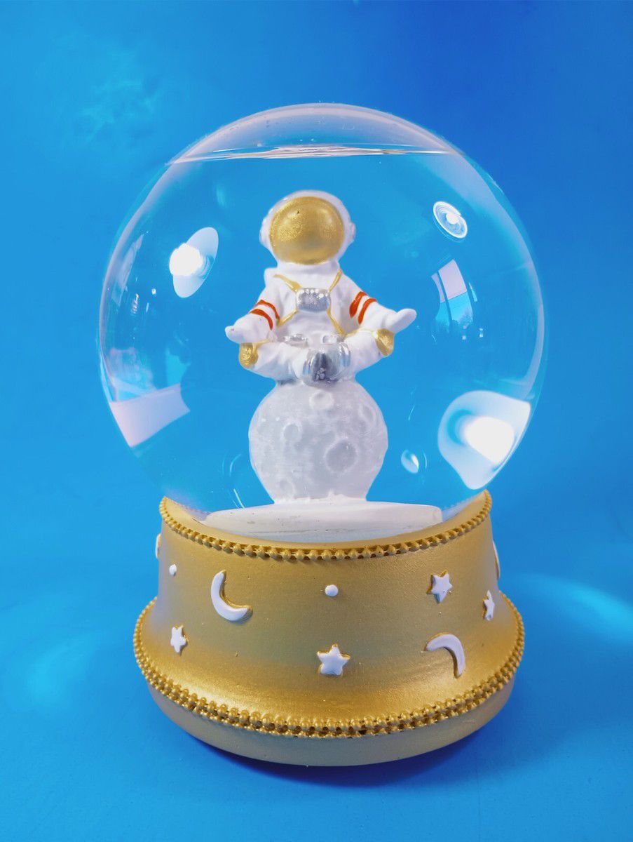 Snow Globe Meditating Astronaut